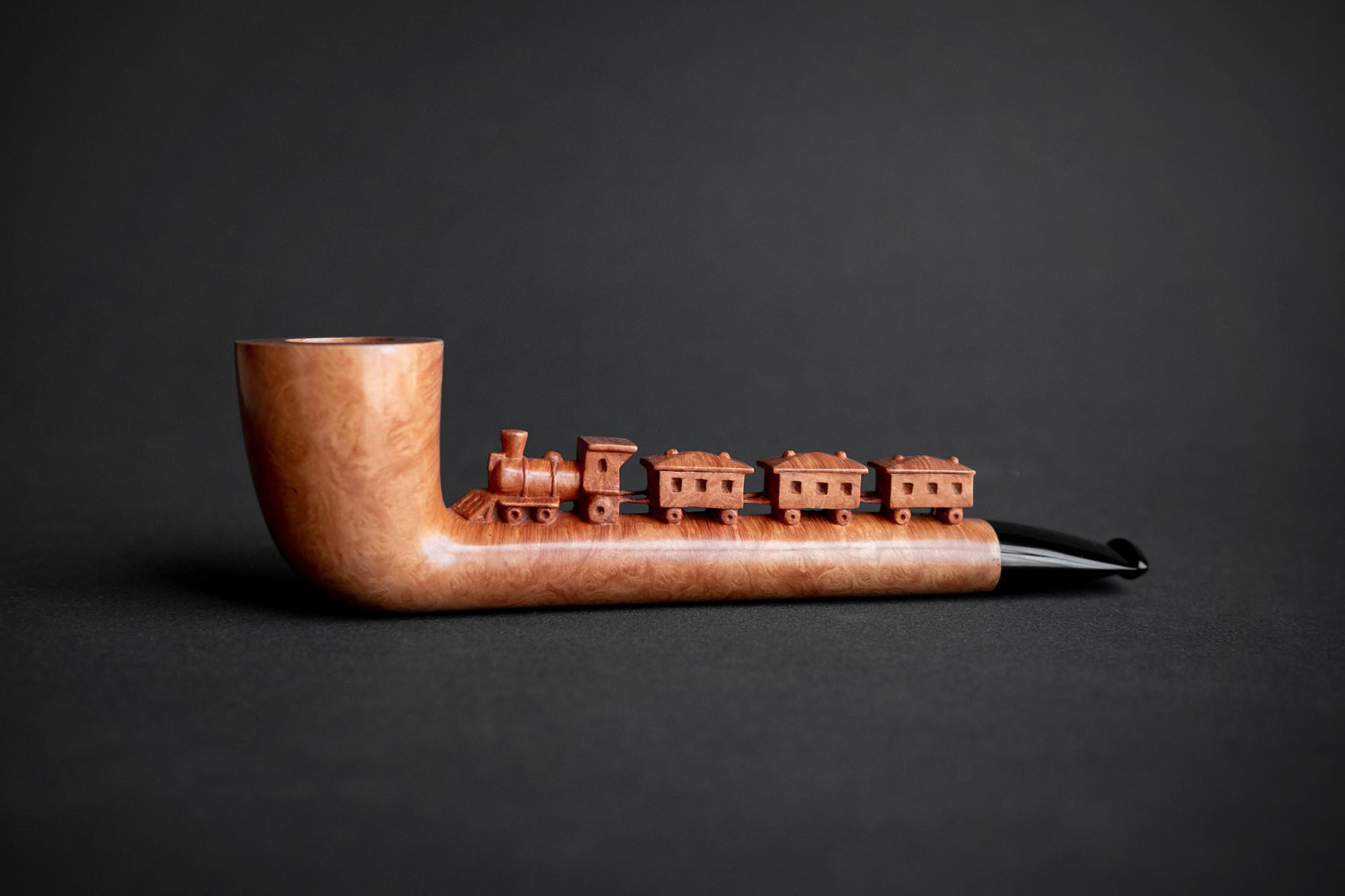 Locomotive pipe, a sculptural smoking pipe hand carved by Arcangelo Ambrosi, based on an illustration by Dino Buzzati