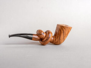 Knotted smoking pipe handmade of apulian olive wood
