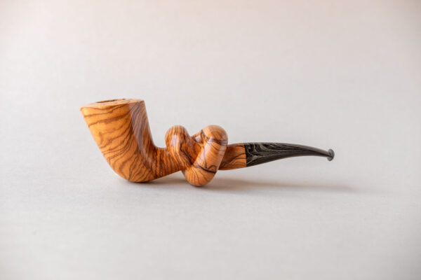 Knotted smoking pipe handmade of apulian olive wood
