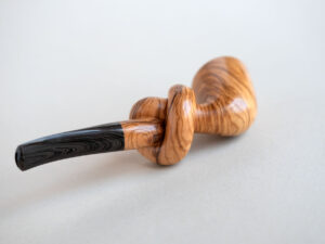 Knotted smoking pipe handmade of apulian olive wood