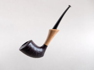 Pickaxe shaped smoking pipe. handmade of briar stained black and with boxwood shank. Ebonite stem.