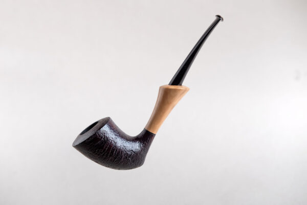 Pickaxe shaped smoking pipe. handmade of briar stained black and with boxwood shank. Ebonite stem.