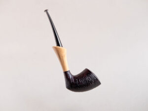 Pickaxe shaped smoking pipe. handmade of briar stained black and with boxwood shank. Ebonite stem.