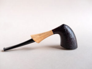 Pickaxe shaped smoking pipe. handmade of briar stained black and with boxwood shank. Ebonite stem.