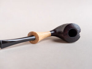 Pickaxe shaped smoking pipe. handmade of briar stained black and with boxwood shank. Ebonite stem.