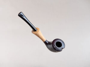 Pickaxe shaped smoking pipe. handmade of briar stained black and with boxwood shank. Ebonite stem.