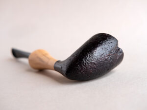 Pickaxe shaped smoking pipe. handmade of briar stained black and with boxwood shank. Ebonite stem.